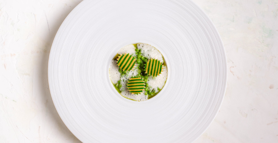 A plate of food with food in the middle A plate of food with food in the middle